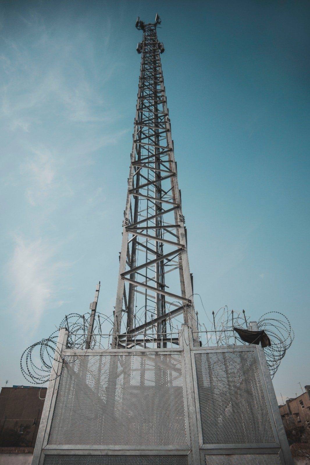 Powerst telecom tower with fencing